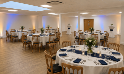 West Parley Community Hub setup with tables and chairs for party